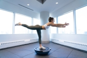 Portrait of a health and fitness expert as she demonstrates form at a health club in Chicago. Il. Image by Chicago photographer Alex Garcia