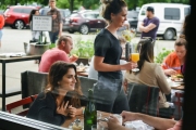 Patrons in the outside eating area of the Lula Cafe in the Logan Square neighborhood of Chicago on a Sunday afternoon.  Chicago photographer Alex Garcia