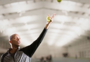 Tennis coach Kamau Murray in between practice sessions at the non-profit XS Tennis Village in Chicago. Murray, who founded XS Tennis and trained tennis star Sloane Stephens, wants to raise up the next generation of tennis players at this facility located on the south side of Chicago. Image by Chicago photographer Alex Garcia