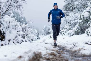 44-Athletic-lifestyle-Man-running-on-muddy-path-in-a-snow-storm-Rod-McLean