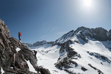 50-two-male-mountaineering-alpinism-athletes-climbing-in-mountains-Rod-McLean