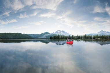 70-Active-Lifestyle-a-man-canoeing-on-a-lake-Rod-Mclean