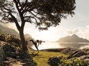 06_Active-Lifestyle-Female-doing-yoga-backbend-with-sun-near-water-Advertising-Photographer-Rod-McLean_gg