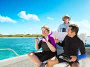 21_Lifestyle-Couple-Snorkeling-Boat-Bahamas-Advertising-Photographer-Rod-McLean_gg