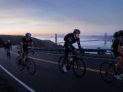 14_Athletic-Active-Lifestyle-Cyclists-ridding-up-hill-at-sunrise-with-golden-gate-bridge-and-city-Adventure-Photographer-Rod-McLean_gg