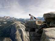 36_Athlete-Male-Runner-Charlie-Engle-stretching-on-Halfdome-Adventure-Photographer-Rod-McLean_GG