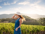 18_Lifestyle-image-female-with-hat-hair-blowing-in-the-wind-in-a-vineyard-Advertising-Photographer-Rod-McLean_GG_1