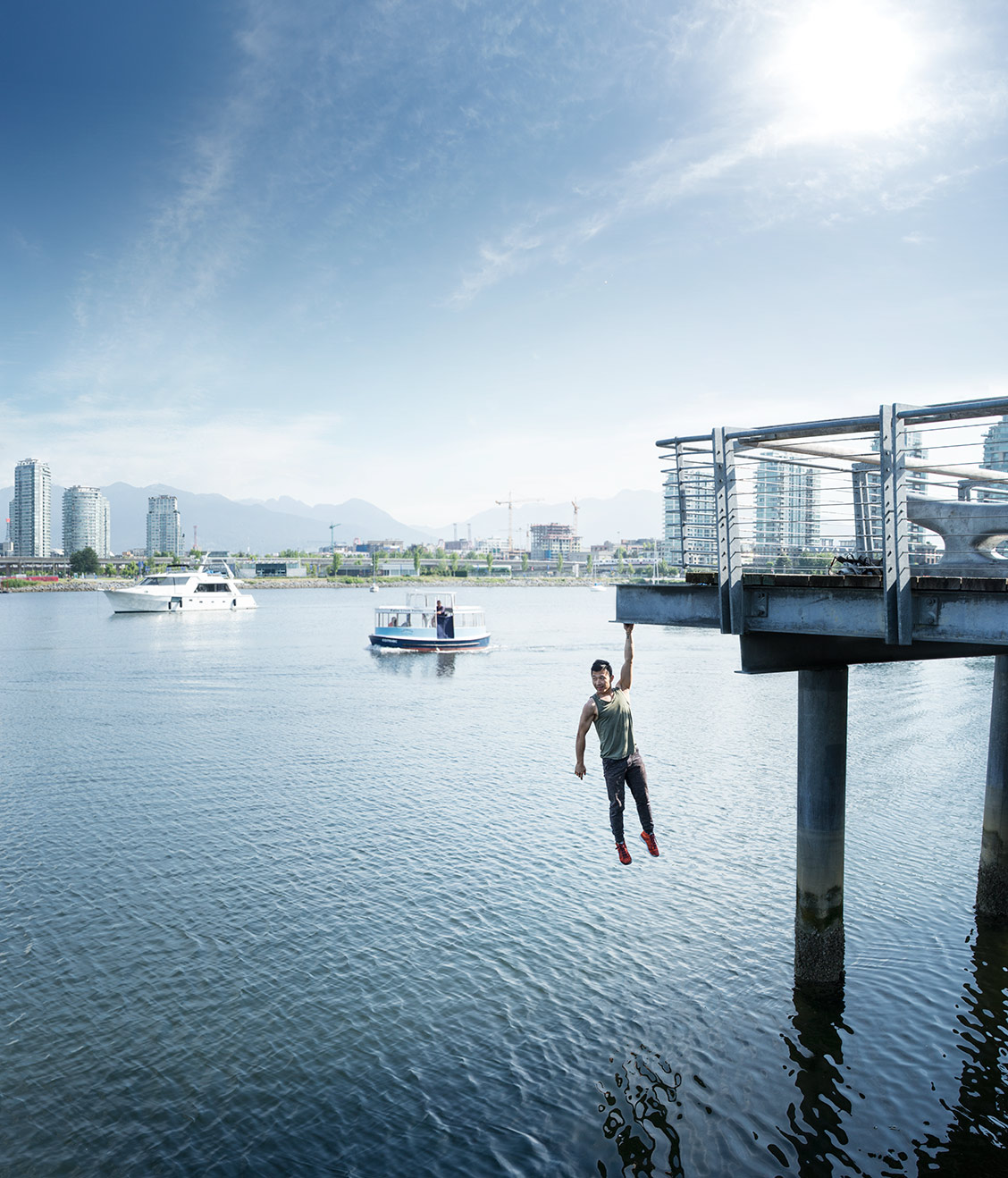 Parkour_hanging_over_water_Rod_McLean_g1